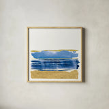 By the Sea I Blue by Jess Aiken. Shown in a natural wood glass frame for a timeless modern aesthetic. Available as an archival giclee rolled canvas, fine art paper, or poster print. SKU 93884a.