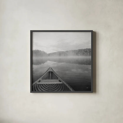 Calm Waters Canoe I BW by Jess Aiken. Shown in a sleek black glass frame for a contemporary gallery look. Available as an archival giclee rolled canvas, fine art paper, or poster print. SKU 83655a.