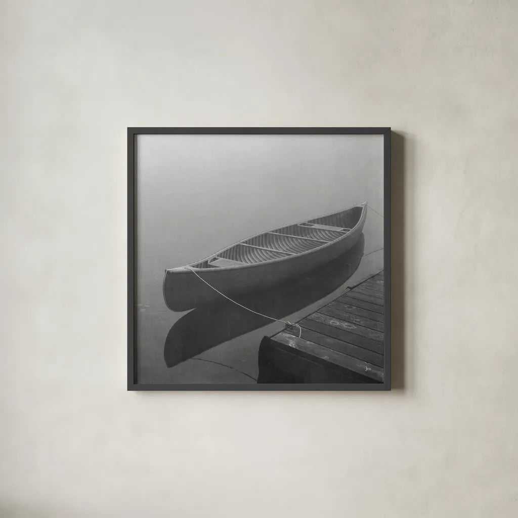 Calm Waters Canoe II BW by Jess Aiken. Shown in a sleek black glass frame for a contemporary gallery look. Available as an archival giclee rolled canvas, fine art paper, or poster print. SKU 83656a.