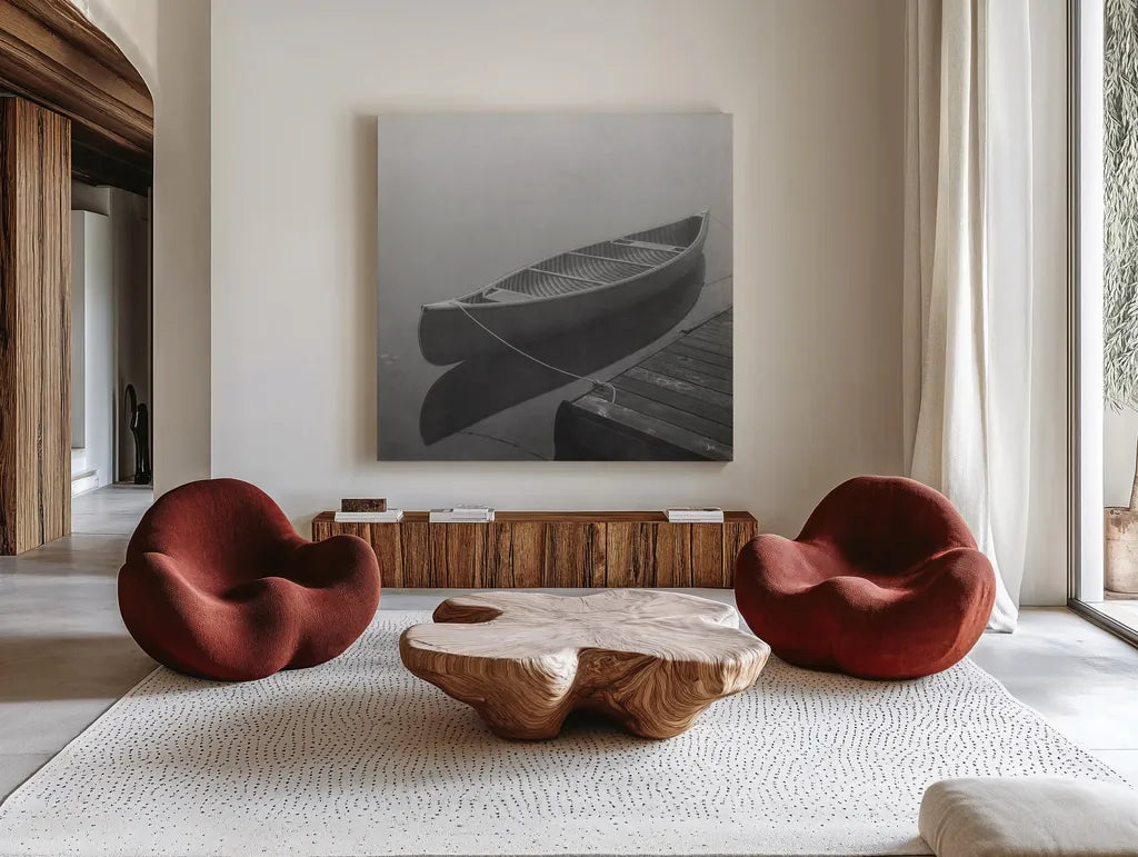 Calm Waters Canoe II BW by Jess Aiken. Shown as extra-large giant wall art in a modern living room. Available as an archival giclee rolled canvas, fine art paper, or poster print. SKU 83656a.