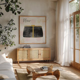Fashion Blooms II Black by Jess Aiken. Shown in a natural wood frame in a cozy modern living room. Available as an archival giclee rolled canvas, fine art paper, or poster print. SKU 45818a.