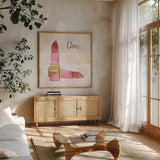 Fashion Blooms III Pink by Jess Aiken. Shown in a natural wood frame in a cozy modern living room. Available as an archival giclee rolled canvas, fine art paper, or poster print. SKU 45815a.