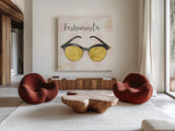 Fashion Blooms IV Black by Jess Aiken. Shown as extra-large giant wall art in a modern living room. Available as an archival giclee rolled canvas, fine art paper, or poster print. SKU 45820a.