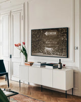 Which Way by Jim Dratfield. shown as a framed stretched canvas in a living room above a console. Available as a archival giclee rolled canvas, fine art paper, or poster print. SKU 25477i.
