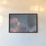 Blue Sky Moonrise by Jocelyn Elizabeth. shown as a paper print in a black flame. Available as a archival giclee rolled canvas, fine art paper, or poster print. SKU 100322i.