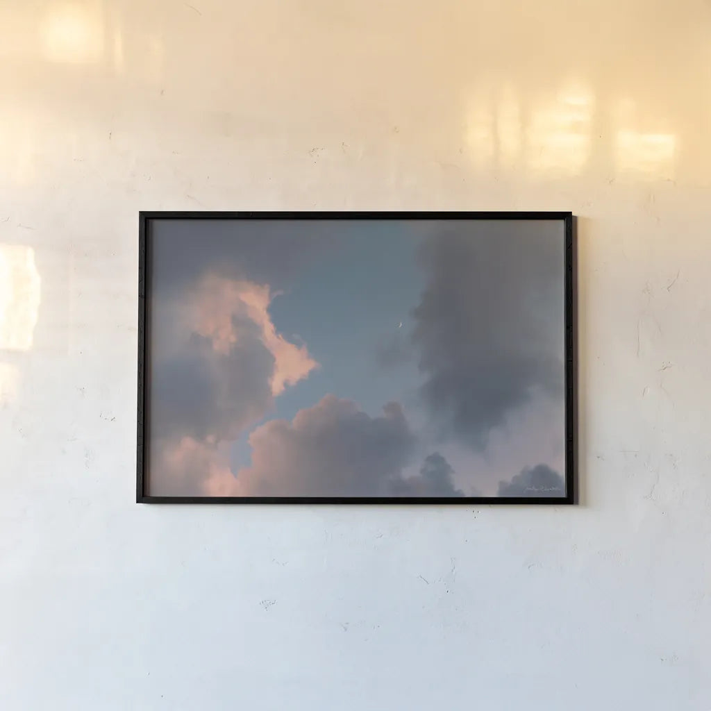 Blue Sky Moonrise by Jocelyn Elizabeth. shown as a paper print in a black flame. Available as a archival giclee rolled canvas, fine art paper, or poster print. SKU 100322i.