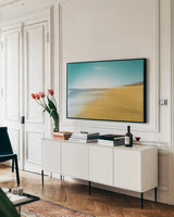 Coast Guard Beach by Jocelyn Elizabeth. shown as a framed stretched canvas in a living room above a console. Available as a archival giclee rolled canvas, fine art paper, or poster print. SKU 94040i.