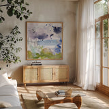 Coastal Storm I by Jocelyn Elizabeth. Shown in a natural wood frame in a cozy modern living room. Available as an archival giclee rolled canvas, fine art paper, or poster print. SKU 101014a.
