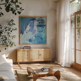 Dive Into the Ocean I by Jocelyn Elizabeth. Shown in a natural wood frame in a cozy modern living room. Available as an archival giclee rolled canvas, fine art paper, or poster print. SKU 100328a.