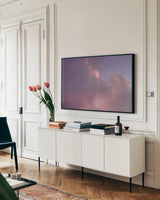Moonset by Jocelyn Elizabeth. shown as a framed stretched canvas in a living room above a console. Available as a archival giclee rolled canvas, fine art paper, or poster print. SKU 94041i.