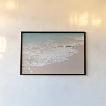 Pink Sand Shoreline by Jocelyn Elizabeth. shown as a paper print in a black flame. Available as a archival giclee rolled canvas, fine art paper, or poster print. SKU 100325i.