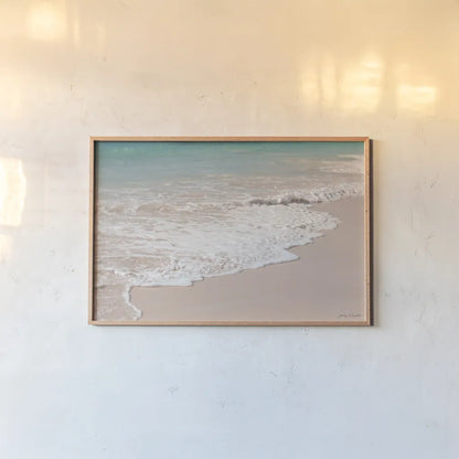 Pink Sand Shoreline by Jocelyn Elizabeth. shown as a paper print in a natural frame. Available as a archival giclee rolled canvas, fine art paper, or poster print. SKU 100325i.