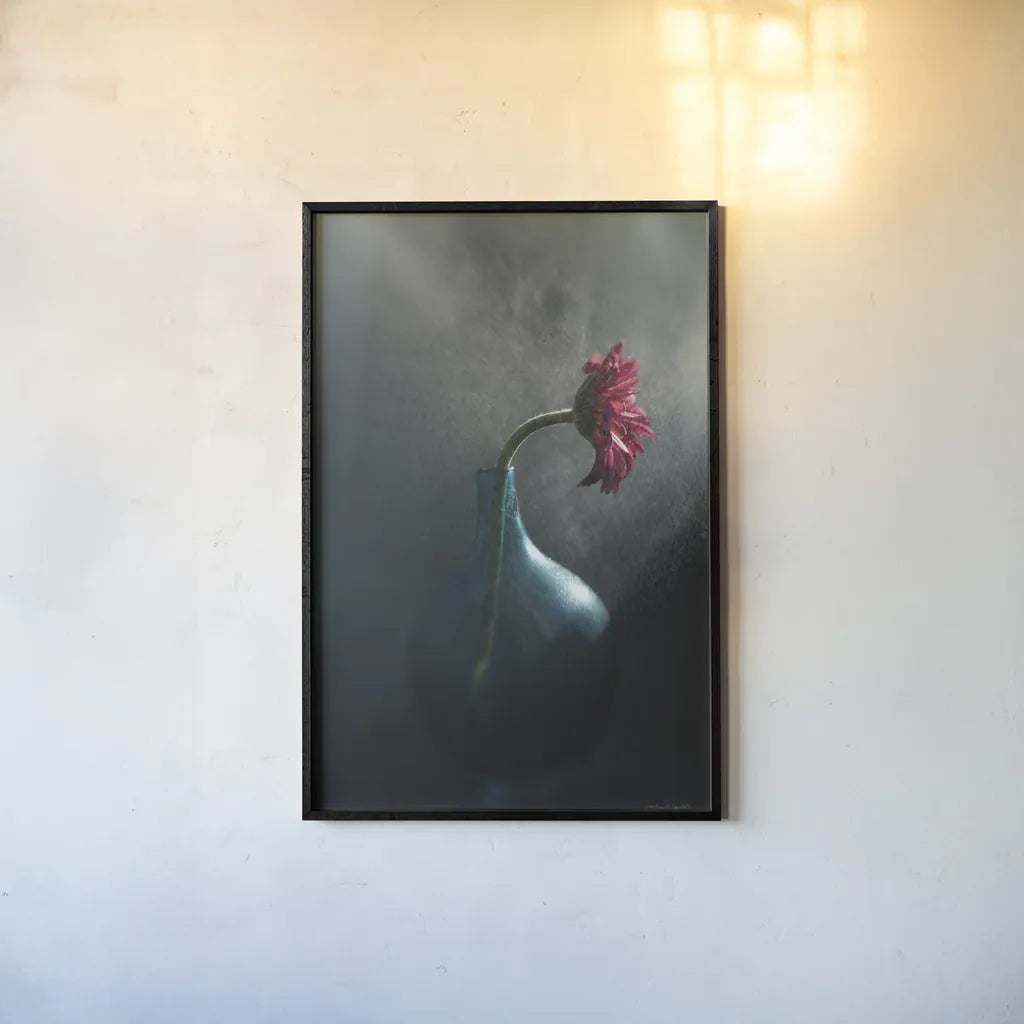 Rainy Daisy by Jocelyn Elizabeth. shown as a paper print in a black flame. Available as a archival giclee rolled canvas, fine art paper, or poster print. SKU 94034h.