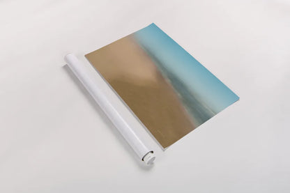 Sand and Surf by Jocelyn Elizabeth. shown as a rolled paper print. Available as archival giclee rolled canvas, fine art paper, or poster print. SKU 94039i.