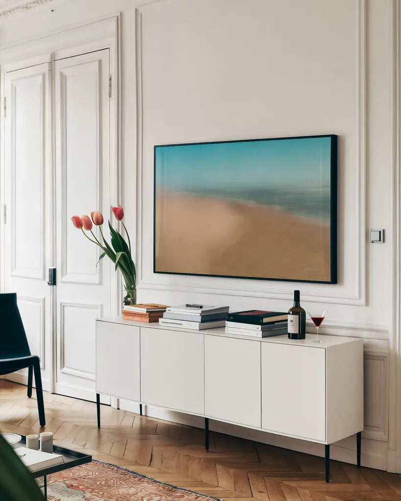 Sand and Surf by Jocelyn Elizabeth. shown as a framed stretched canvas in a living room above a console. Available as a archival giclee rolled canvas, fine art paper, or poster print. SKU 94039i.