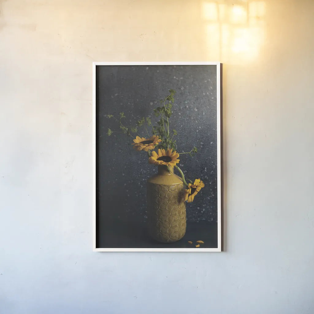 Sunflower Still Life by Jocelyn Elizabeth. shown as a paper print in a white frame. Available as a archival giclee rolled canvas, fine art paper, or poster print. SKU 94035h.