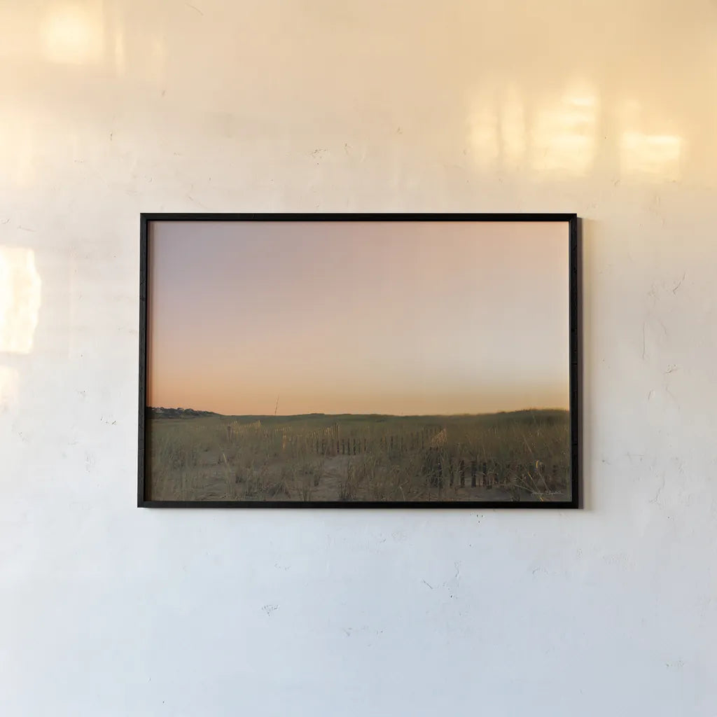 Sunrise over the Dunes by Jocelyn Elizabeth. shown as a paper print in a black flame. Available as a archival giclee rolled canvas, fine art paper, or poster print. SKU 102107i.