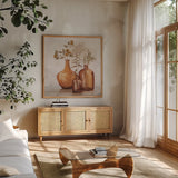 Amber Autumn Orange by Julia Purinton. Shown in a natural wood frame in a cozy modern living room. Available as an archival giclee rolled canvas, fine art paper, or poster print. SKU 87354a.
