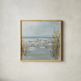 Beach Birds III by Julia Purinton. Shown in a natural wood glass frame for a timeless modern aesthetic. Available as an archival giclee rolled canvas, fine art paper, or poster print. SKU 99746a.