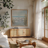 Beach Birds III by Julia Purinton. Shown in a natural wood frame in a cozy modern living room. Available as an archival giclee rolled canvas, fine art paper, or poster print. SKU 99746a.