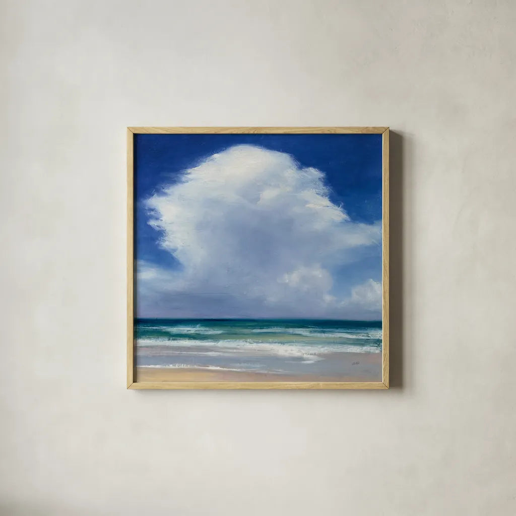 Beach Clouds II by Julia Purinton. Shown in a natural wood glass frame for a timeless modern aesthetic. Available as an archival giclee rolled canvas, fine art paper, or poster print. SKU 33436a.