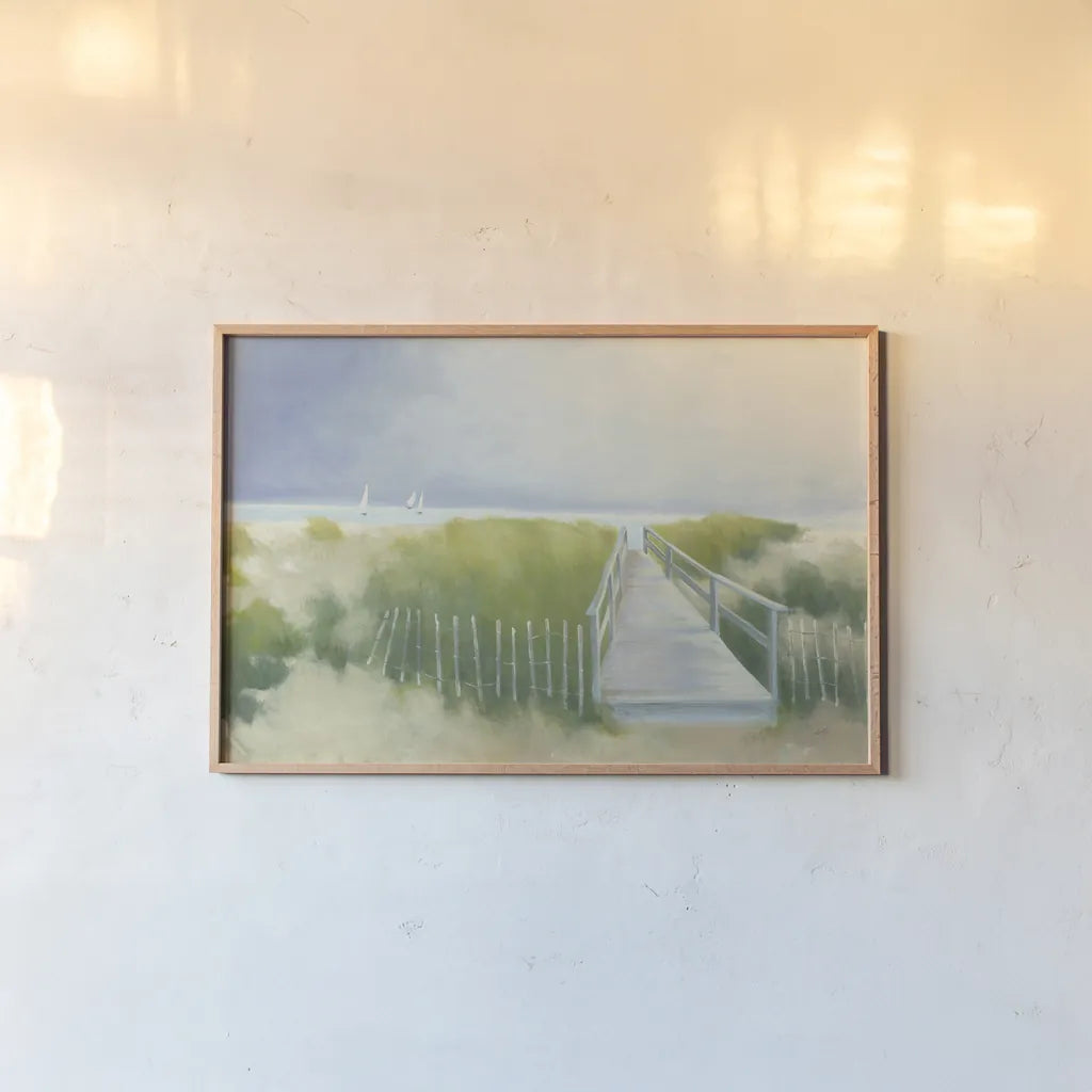 Beach Walk with Boats by Julia Purinton. shown as a paper print in a natural frame. Available as a archival giclee rolled canvas, fine art paper, or poster print. SKU 48171i.