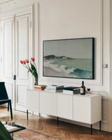Beachcomber by Julia Purinton. shown as a framed stretched canvas in a living room above a console. Available as a archival giclee rolled canvas, fine art paper, or poster print. SKU 103393i.
