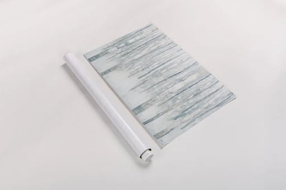 Birches in Winter Blue Gray by Julia Purinton. shown as a rolled paper print. Available as archival giclee rolled canvas, fine art paper, or poster print. SKU 21964i.