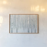 Birches in Winter Blue Gray by Julia Purinton. shown as a paper print in a natural frame. Available as a archival giclee rolled canvas, fine art paper, or poster print. SKU 21964i.