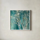 Blue Birch by Julia Purinton. Shown in a crisp white glass frame for a clean and minimalist style. Available as an archival giclee rolled canvas, fine art paper, or poster print. SKU 13730a.