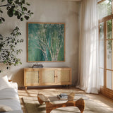 Blue Birch Green by Julia Purinton. Shown in a natural wood frame in a cozy modern living room. Available as an archival giclee rolled canvas, fine art paper, or poster print. SKU 37741a.