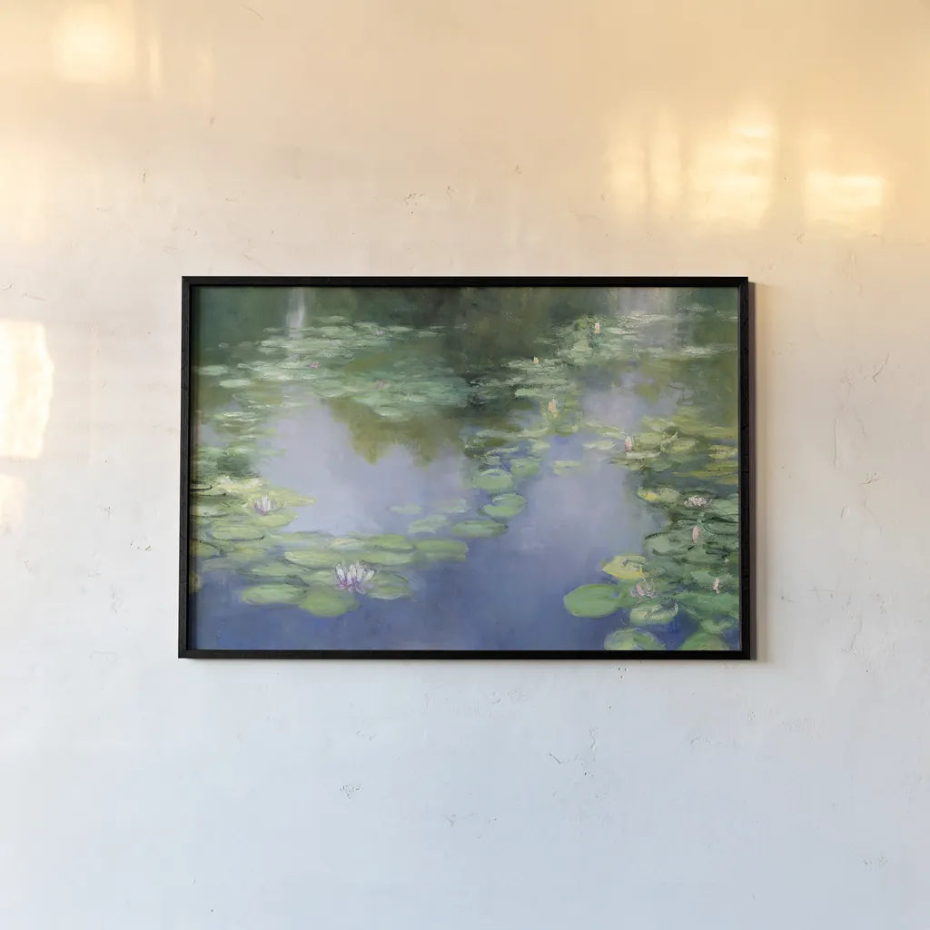 Blue Lily III by Julia Purinton. shown as a paper print in a black flame. Available as a archival giclee rolled canvas, fine art paper, or poster print. SKU 22439i.