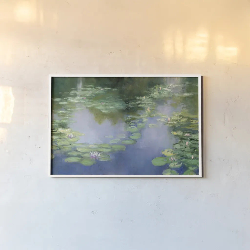 Blue Lily III by Julia Purinton. shown as a paper print in a white frame. Available as a archival giclee rolled canvas, fine art paper, or poster print. SKU 22439i.