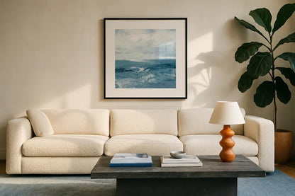 Blue Waves by Julia Purinton. Displayed in a glass frame with matte in a clean modern living room. Available as an archival giclee rolled canvas, fine art paper, or poster print. SKU 73108a.