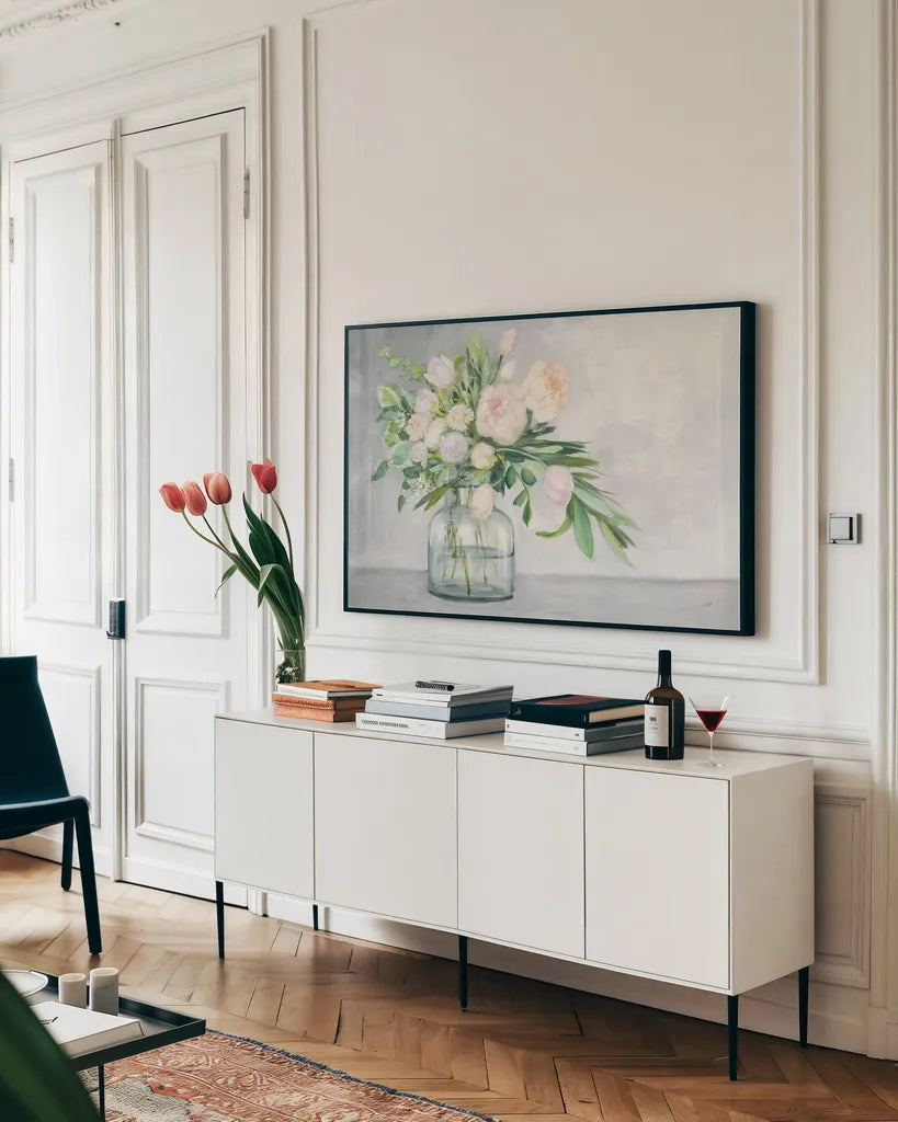 Blushing Spring Bouquet by Julia Purinton. shown as a framed stretched canvas in a living room above a console. Available as a archival giclee rolled canvas, fine art paper, or poster print. SKU 55361i.