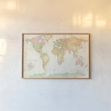 Bright World by Julia Purinton. shown as a paper print in a natural frame. Available as a archival giclee rolled canvas, fine art paper, or poster print. SKU 53229i.