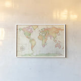 Bright World by Julia Purinton. shown as a paper print in a white frame. Available as a archival giclee rolled canvas, fine art paper, or poster print. SKU 53229i.