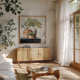 Calm Still Life Dark I by Julia Purinton. Shown in a natural wood frame in a cozy modern living room. Available as an archival giclee rolled canvas, fine art paper, or poster print. SKU 83018a.