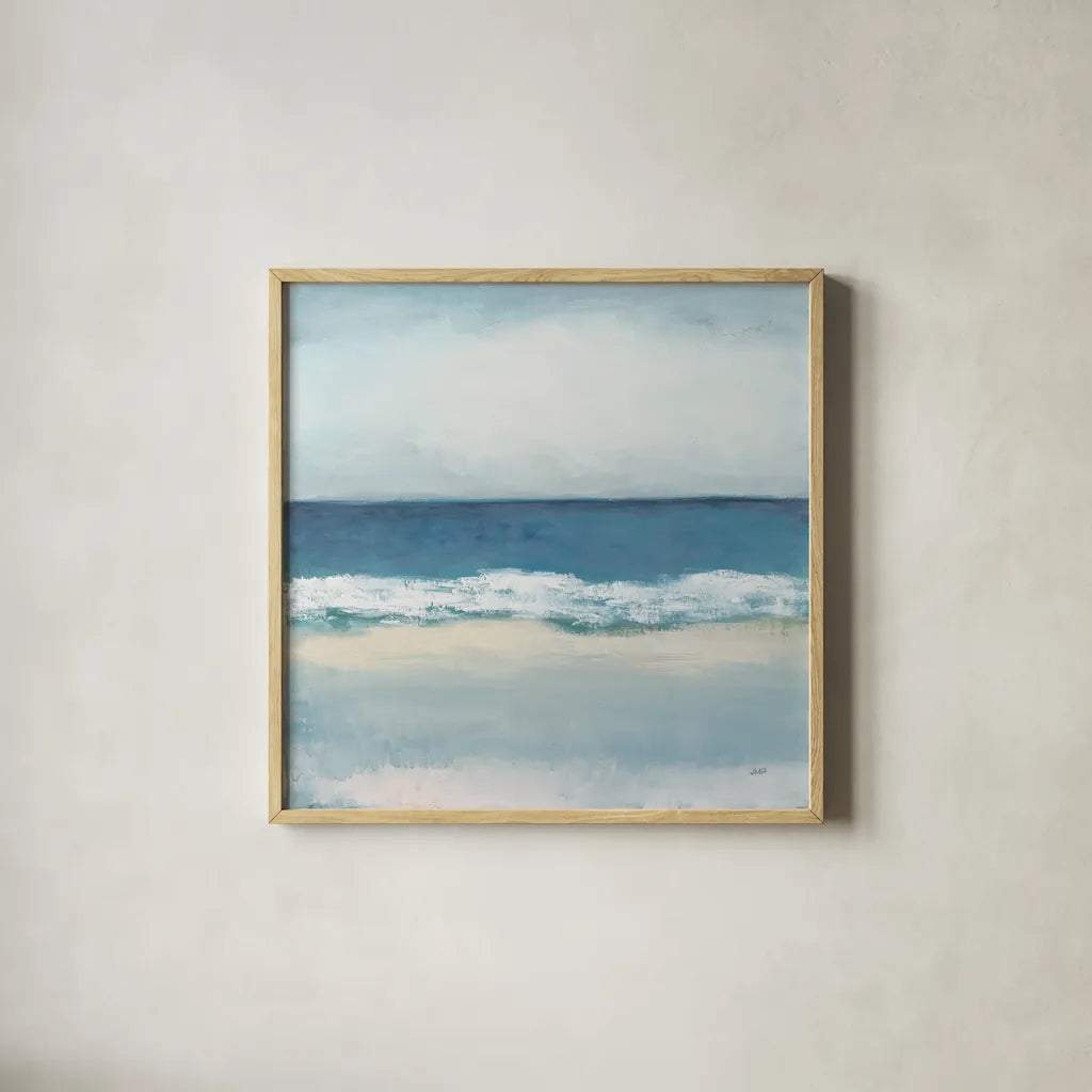 Calming Coast by Julia Purinton. Shown in a natural wood glass frame for a timeless modern aesthetic. Available as an archival giclee rolled canvas, fine art paper, or poster print. SKU 86695a.