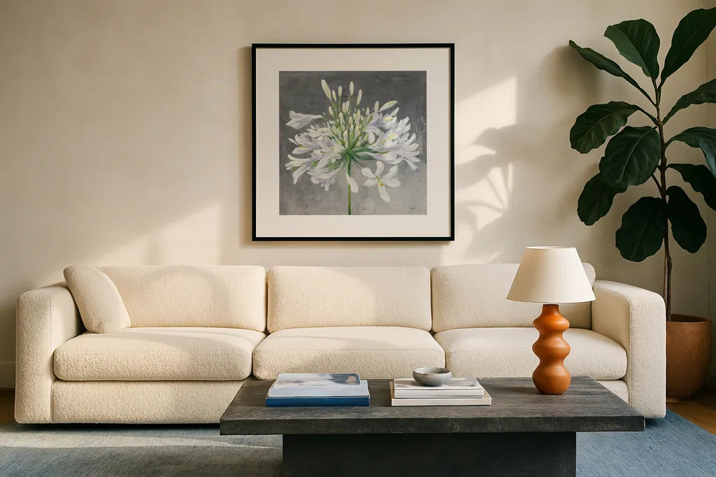 Cleome Splash I by Julia Purinton. Displayed in a glass frame with matte in a clean modern living room. Available as an archival giclee rolled canvas, fine art paper, or poster print. SKU 47855a.