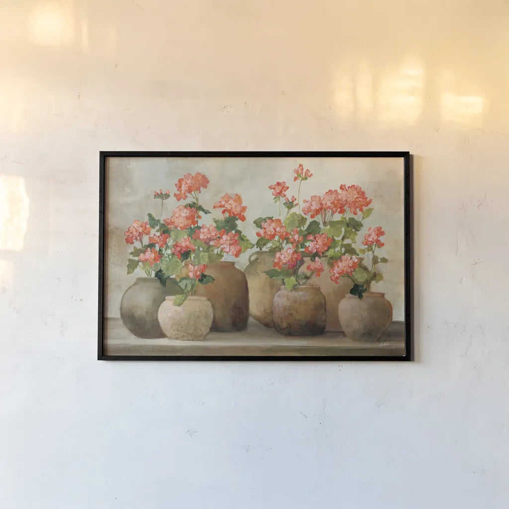 Cottage Geraniums by Julia Purinton. shown as a paper print in a black flame. Available as a archival giclee rolled canvas, fine art paper, or poster print. SKU 81284i.