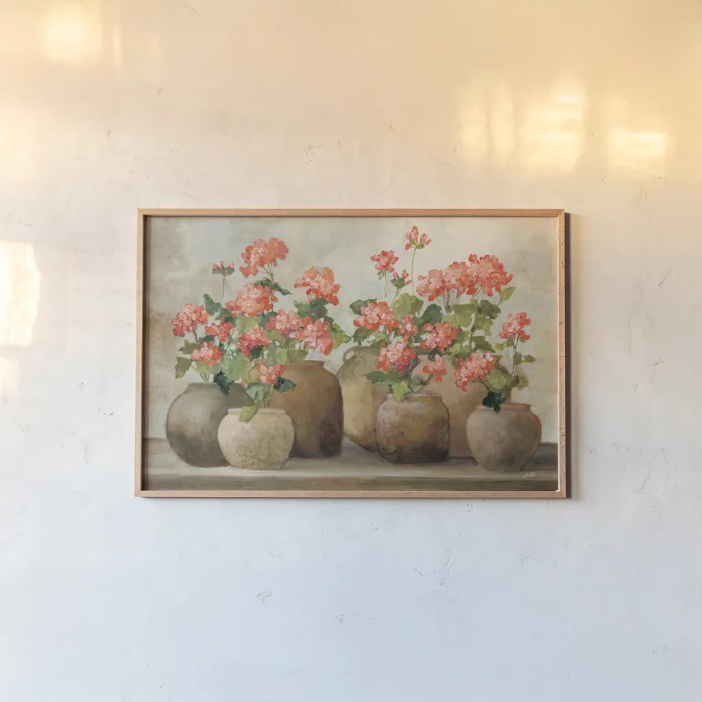 Cottage Geraniums by Julia Purinton. shown as a paper print in a natural frame. Available as a archival giclee rolled canvas, fine art paper, or poster print. SKU 81284i.