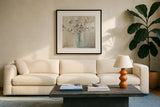 Cotton Bouquet Crop by Julia Purinton. Displayed in a glass frame with matte in a clean modern living room. Available as an archival giclee rolled canvas, fine art paper, or poster print. SKU 31779a.
