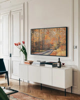 Country Road by Julia Purinton. shown as a framed stretched canvas in a living room above a console. Available as a archival giclee rolled canvas, fine art paper, or poster print. SKU 9222i.