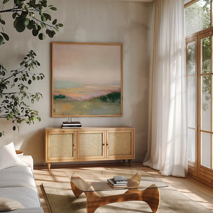 Dark Glowing Valley by Julia Purinton. Shown in a natural wood frame in a cozy modern living room. Available as an archival giclee rolled canvas, fine art paper, or poster print. SKU 70442a.