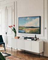 Dawn by the Water No Lavender by Julia Purinton. shown as a framed stretched canvas in a living room above a console. Available as a archival giclee rolled canvas, fine art paper, or poster print. SKU 59313i.