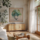 Festive Succulents I Blush by Julia Purinton. Shown in a natural wood frame in a cozy modern living room. Available as an archival giclee rolled canvas, fine art paper, or poster print. SKU 66123a.