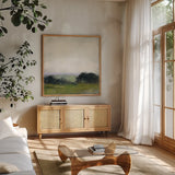 First View of the Water by Julia Purinton. Shown in a natural wood frame in a cozy modern living room. Available as an archival giclee rolled canvas, fine art paper, or poster print. SKU 76014a.