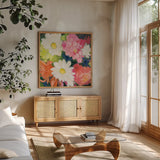 Floral Spectacular II by Julia Purinton. Shown in a natural wood frame in a cozy modern living room. Available as an archival giclee rolled canvas, fine art paper, or poster print. SKU 90690a.