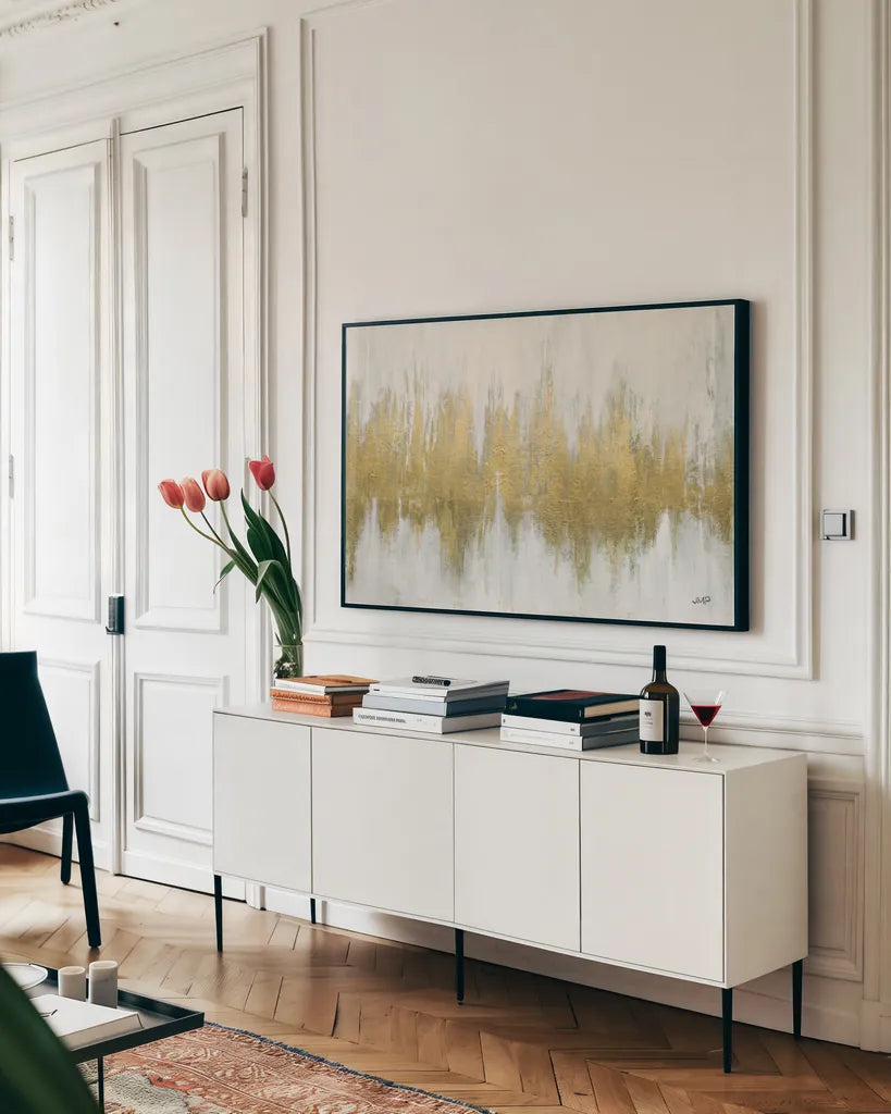 Glimmer I Brushed Gold Crop by Julia Purinton. shown as a framed stretched canvas in a living room above a console. Available as a archival giclee rolled canvas, fine art paper, or poster print. SKU 84849i.